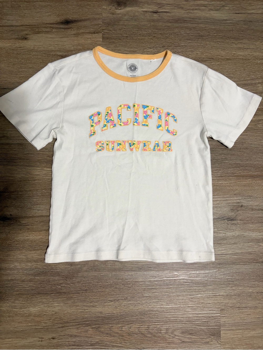 Pacific Sunwear White Tee with Yellow Ringer and Multicolor Floral Logo